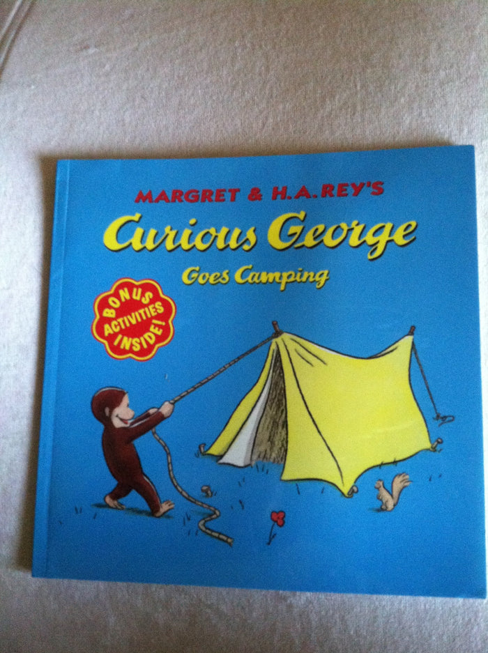 Curious George Goes Camping by H. A. Rey - Paperback cover