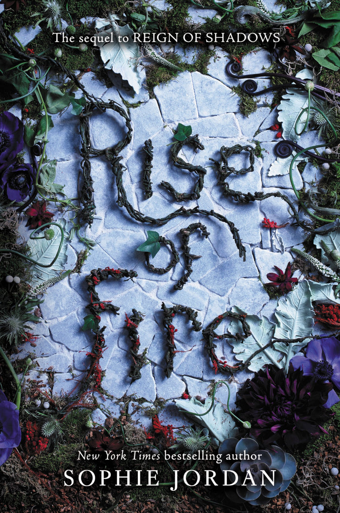 Rise of Fire: A Suspenseful Fantasy Sequel Where Two Lovers Become Pawns in a Kingdom's Deadly Political Game (Reign of Shadows, 2) by Sophie Jordan - Paperback cover
