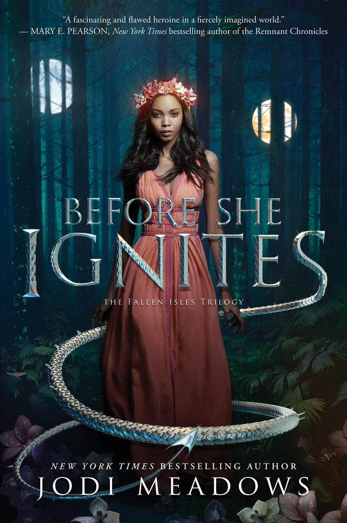 Before She Ignites: A Gripping YA Fantasy of Dragons, Slow Burn Romance, and Found Family (Fallen Isles, 1) by Jodi Meadows - Paperback cover