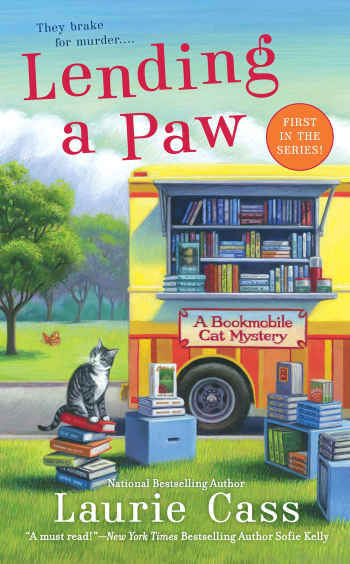 Lending a Paw: A Bookmobile Cat Mystery by Laurie Cass - Mass Market Paperback cover